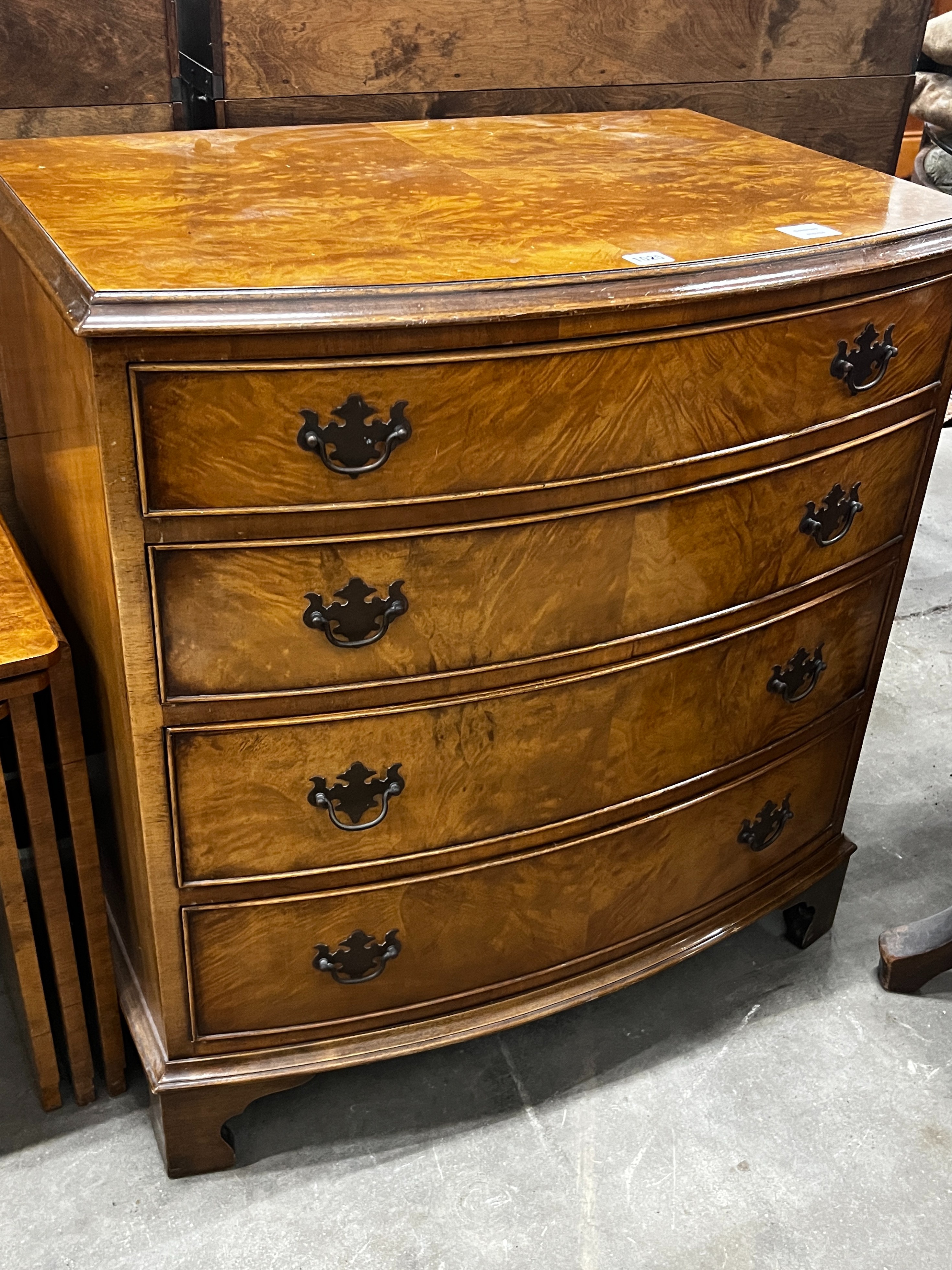 A reproduction George I style walnut bowfront chest, width 78cm, depth 52cm, height 84cm